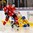 BUFFALO, NEW YORK - DECEMBER 30: Switzerland's Andre Heim #24 controls the puck behind the nets Sweden's Alexander Nylander #19 takes a tumble during the preliminary round of the 2018 IIHF World Junior Championship. (Photo by Andrea Cardin/HHOF-IIHF Images)

